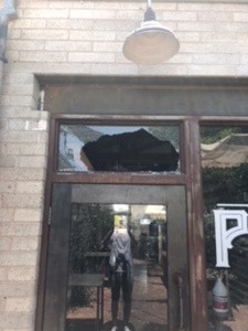 broken tempered glass in storefront