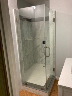 Frameless shower door chrome hardware